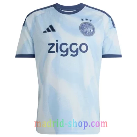 Camiseta Ajax Tercera Equipación 2026-27 azul celeste con tres estrellas bordadas.