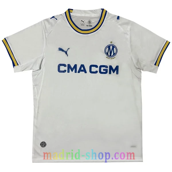 Camiseta Olympique de Marsella Primera Equipación 2026-27 Camiseta Olympique de Marsella Primera Equipación 2026-27 blanca con nuevo escudo.