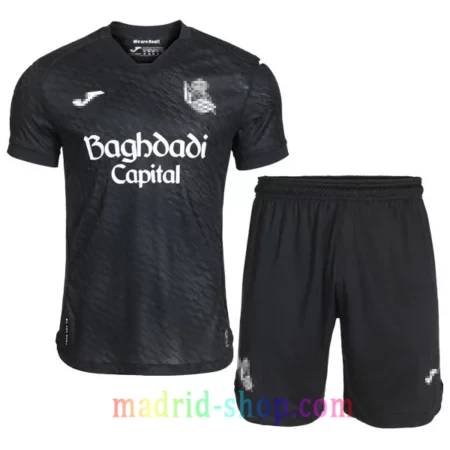 Camiseta Real Sociedad Segunda Equipación 2026-27 Niño conjunto infantil con pantalón corto negro.