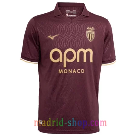 Camiseta AS Monaco Segunda Equipación 2026-27 marron uva con detalles dorados y monograma ASM.