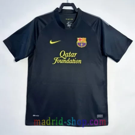 Camiseta Barcelona Segunda Equipación 2011-12 Retro negra con detalles amarillos.