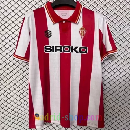 Camiseta Sporting de Gijón Primera Equipación 2026-27 roja y blanca con Cruz de la Victoria.