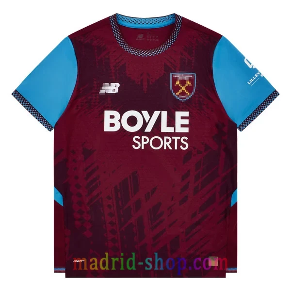 Camiseta West Ham Primera Equipación 2026-27 Versión Jugador Camiseta West Ham Primera Equipación 2026-27 Versión Jugador granate con mangas azul celeste.